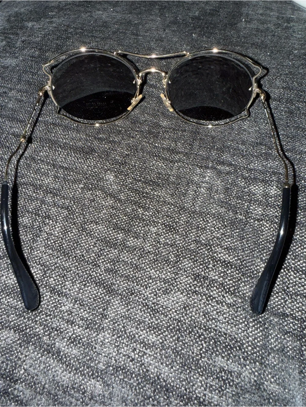 Miu Miu Gold Frame Sunglasses with Black Lenses